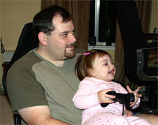 A picture of Joe Straitiff and his baby daughter